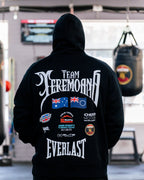 Back of the black Team Teremoana Hoodie showing the full back print with the Australian and Cook Islands flags and sponsor logos