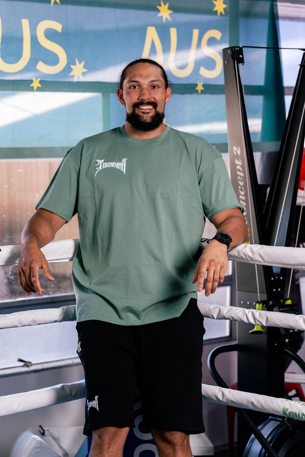 Teremoana in the Sage Team Teremoana tee leaning on the ring ropes