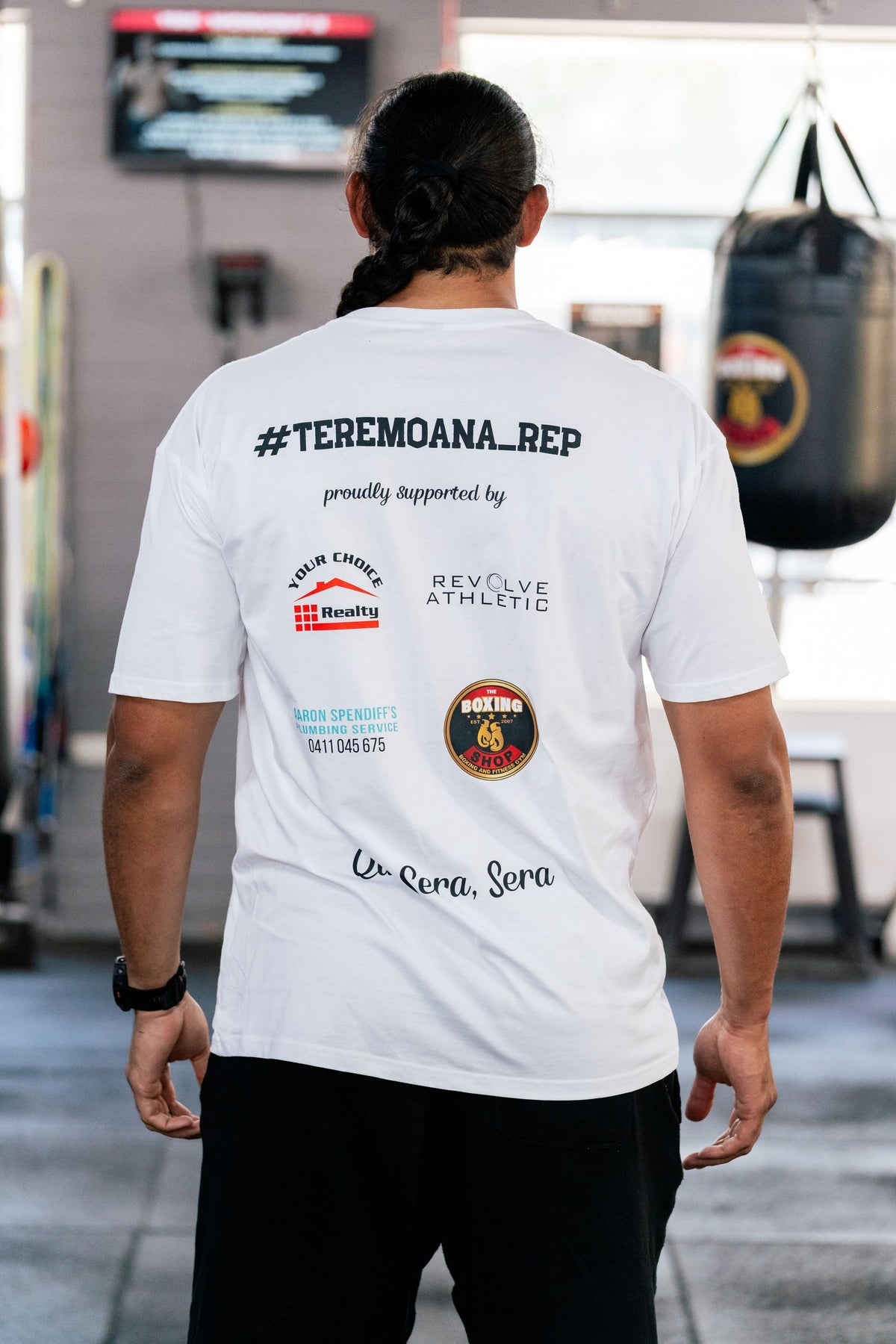 Back of the white Teremoana Boxing tee showing the #TEREMOANA_REP sponsor print